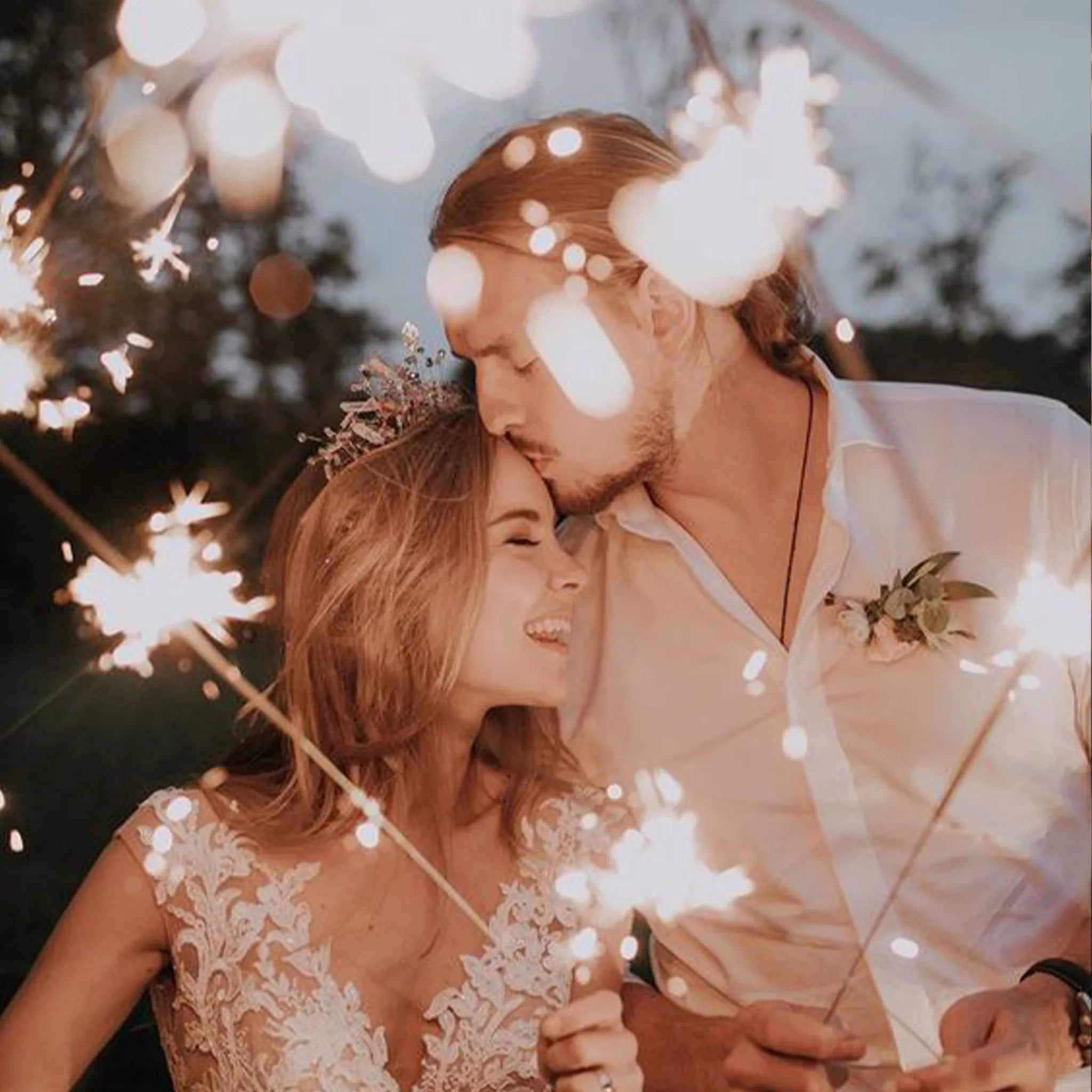 Wedding kiss with sparkler send off